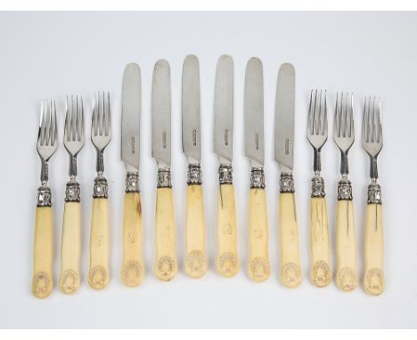  A set of six early-Victorian silver and ivory fruit knives and forks Alexander Hunt, Sheffield 1838, with lappet mounts to t