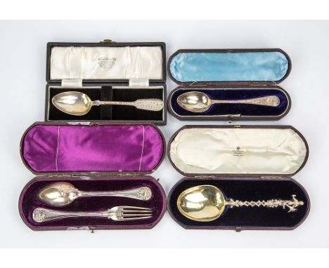  A cased Victorian silver christening fork and spoon set Martin, Hall & Co., London 1893; together with a cased Hanau silver 