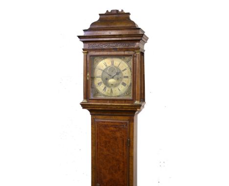 A good George II burr and figured walnut eight day longcase clock with interesting converted Duplex movement the five knopped