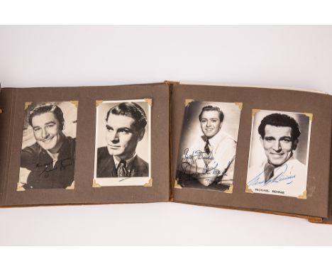  A collection of film and TV star autographs comprising two 1950s leather albums of signed photographs and postcards, some fa