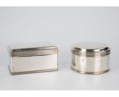 A set of two Dutch silver biscuit boxes 19th century, both with maker's mark for Pieter Pieterse, Amsterdam 1865 and retailer