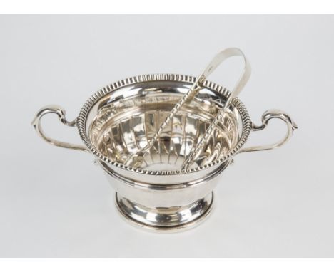  A George VI silver twin handled sugar basin Adie Bros. Birmingham 1950, urn form with half fluted decoration and scroll hand