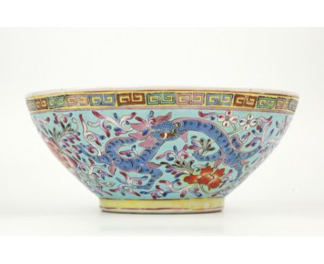 A Chinese famille rose porcelain bowl with four character Qianlong mark (1736-95) and of the period, turquoise interior, exte