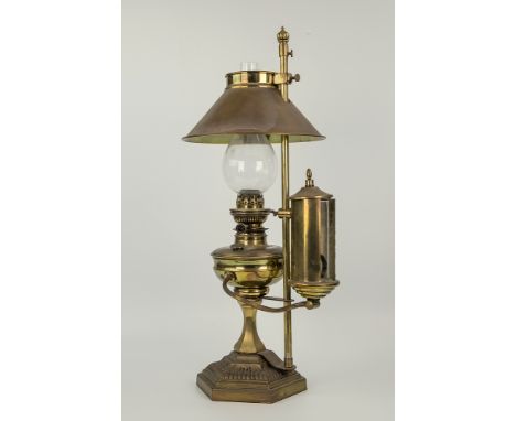  A Victorian student's oil lamp challis style reservoir with hexagonal stem seated upon a stepped and raised hexagonal foot w