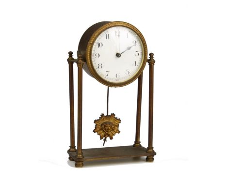  A gilt brass portico mantel clock early 20th century, with enamel Arabic dial, sunburst pendulum and single train movement, 