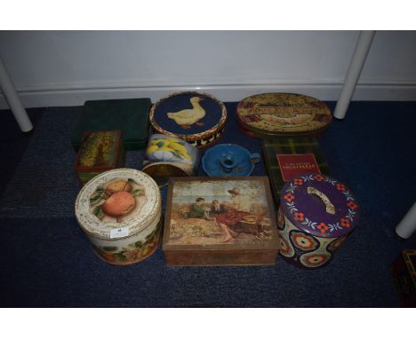 Eight Vintage Tins and a Candle Holder