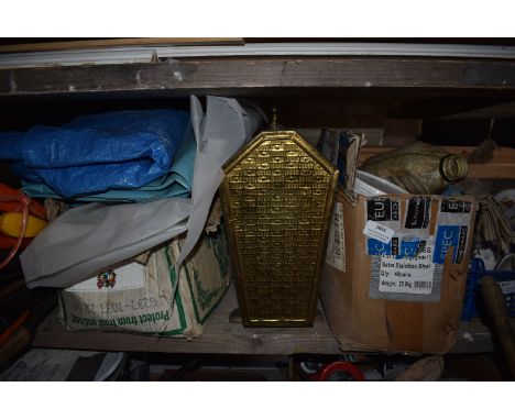 Shelf Containing Box of Candles, Newspaper Rack, etc.