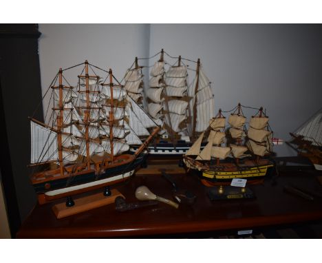 Four Wooden Model Boats; Mayflower, HMS Victory, and Two Scrat Built, plus a Metal Figure of a Man Rowing a Dinghy, and Three
