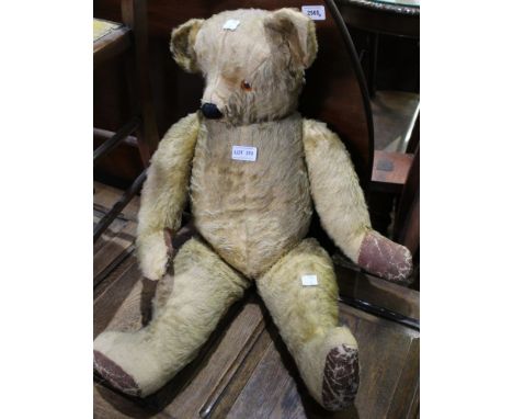 A large vintage jointed teddy bear, 68cm high