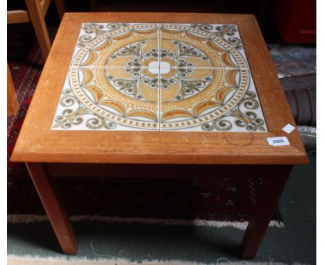 A tile top retro coffee table