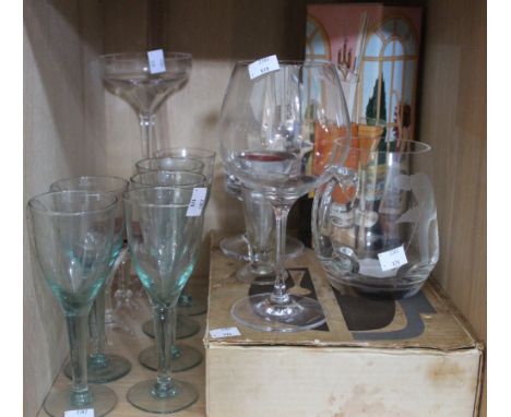 A shelf of good quality glassware including Dartington examples