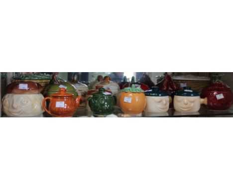 A shelf containing a wide selection of Sylvac condiment and storage jars