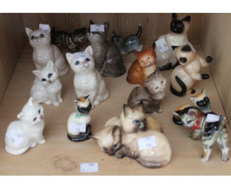 A selection of ceramic cats including Beswick examples