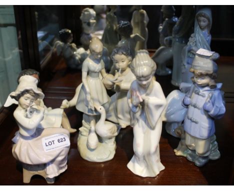 A quantity of continental ceramic figures, includes Nao and Lladro