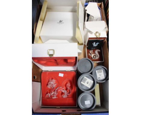 A Swarovski Dragon in original box, together with a boxed squirrel and various others in boxes and tubes Condition: The main 