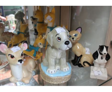 A lot containing an interesting collection of ceramic and advertising items. Babycham, Bertie Badger etc