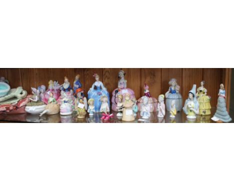 A shelf containing a good selection of crinoline ladies dressing table boxes and fashioned porcelain handles in the form of h