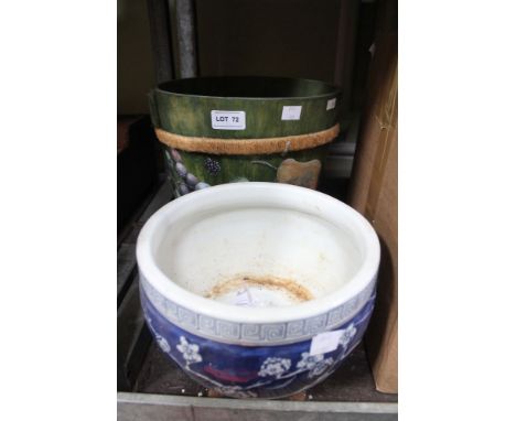 A blue and white Oriental planter with another example