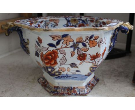 A late 19th century ironstone octagonal planter, decorated in the Oriental taste with Dragon mask handles, a/f