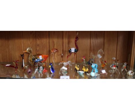 A shelf containing a wide selection of glass animal models (28)