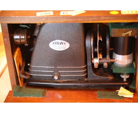 Mahogany cased Aldis Universal projector. Not available for in-house P&amp;P 