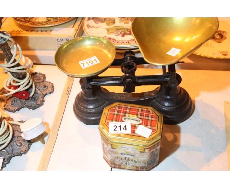 Pair of cast iron vintage kitchen scales with a tin of copstran brass weights. Not available for in-house P&amp;P 