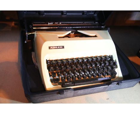 Plastic cased Adler typewriter. Not available for in-house P&amp;P 