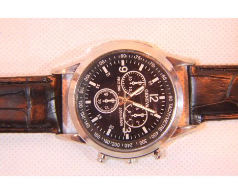 New old stock gents multi dial Geneva stainless steel wristwatch. P&amp;P Group 1 (£14+VAT for the first lot and £1+VAT for s