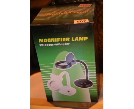 Boxed magnifier lamp. P&amp;P Group 1 (£14+VAT for the first lot and £1+VAT for subsequent lots) 
