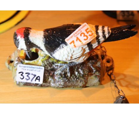 Cast iron woodpecker door knocker, L: 18 cm. P&amp;P Group 1 (£14+VAT for the first lot and £1+VAT for subsequent lots) 