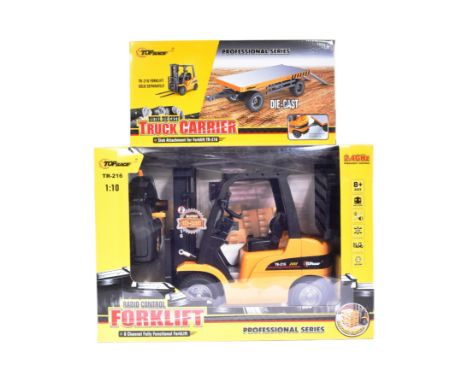 Radio Control - an original Top Race made Professional Series 1/10 scale RC model Fork Lift and Truck Carrier. Both appearing