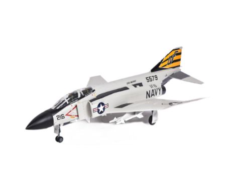 Models - a scale plastic model of a US Navy Fantom F-4 5579 USS Midway jet, in grey, with black and yellow detailing. Profess