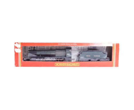 A vintage Hornby OO gauge model railway trainset locomotive engine No. R532 Class 28XX 2-8-0 2859 in GWR Green. Housed within
