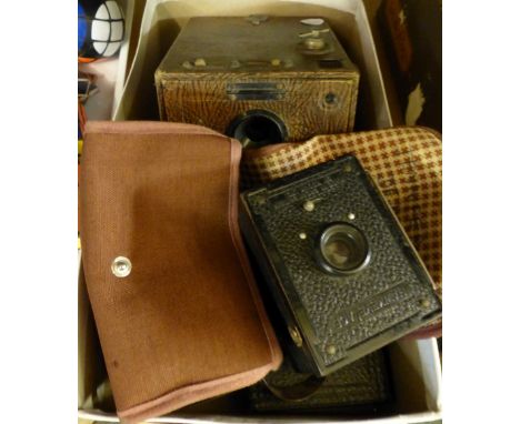 Box of vintage camera equipment