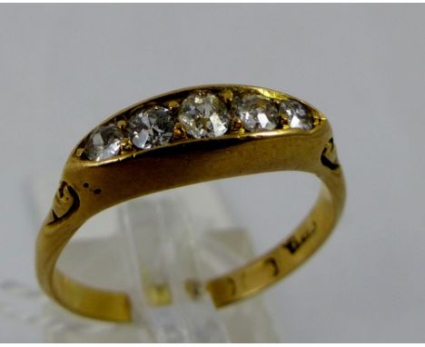 18 ct gold five stone diamond ring. Size T. 4.6g.