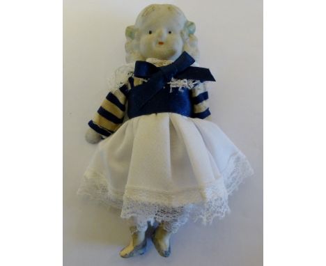 Vintage doll with ceramic head and extremeties