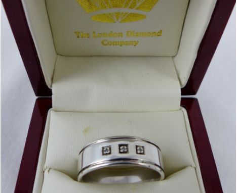 Solid silver gents ring, size Y set with 3 small diamonds