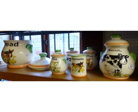 Shelf of modern ceramic kitchen containers