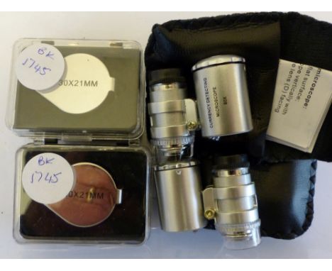 Two 30mmm jewellers loupes and two UV 60 mag note checkers