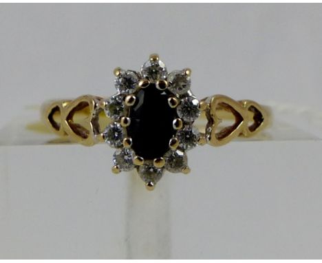 9ct gold sapphire and CZ cluster ring, size N