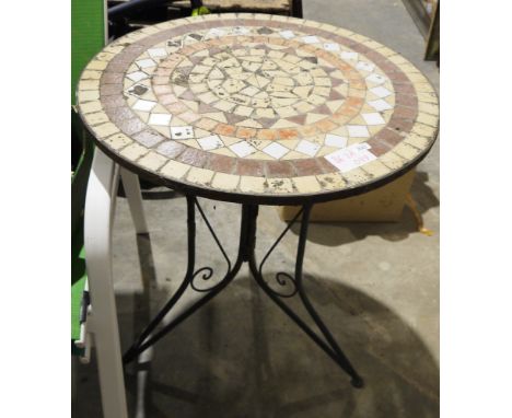 Circular garden table&nbsp;with mosaic inlaid top, on cast iron tripod feet and two matching folding chairs&nbsp;(3)&nbsp;