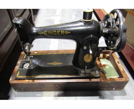 Vintage Singer table top sewing machine in domed wooden case