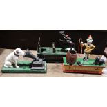 Cast iron 'Show Jumper' money box, a cast iron 'Trick Dog' money box and a cast iron model of HMV