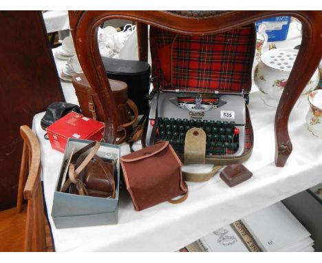 A mixed lot including binoculars, camera's and portable typewriter