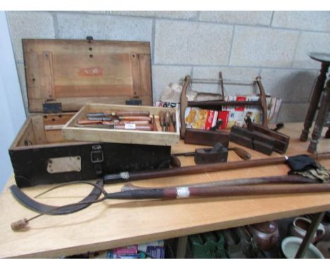 A tool box and a collection of vintage and other wood working tools