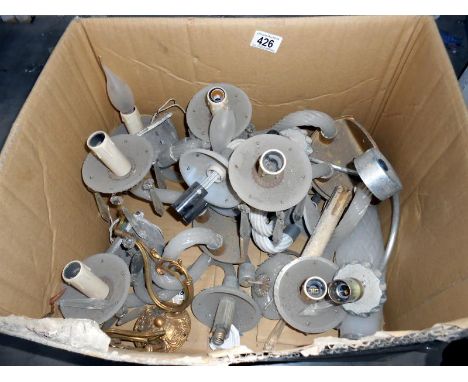 A box of assorted chandelier parts