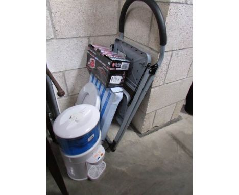 A step ladder, water cooler, Russell Hobbs steam iron and 2 toilet seats