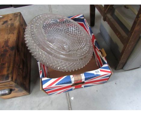 A large glass lamp shade