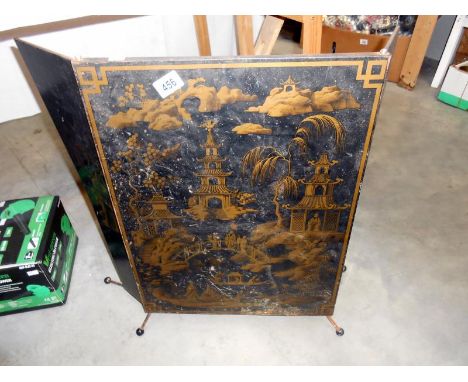 A metal 3 fold fire screen