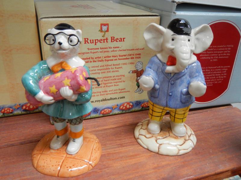 A collection of 5 Royal Doulton Rupert the Bear figurines (all boxed)